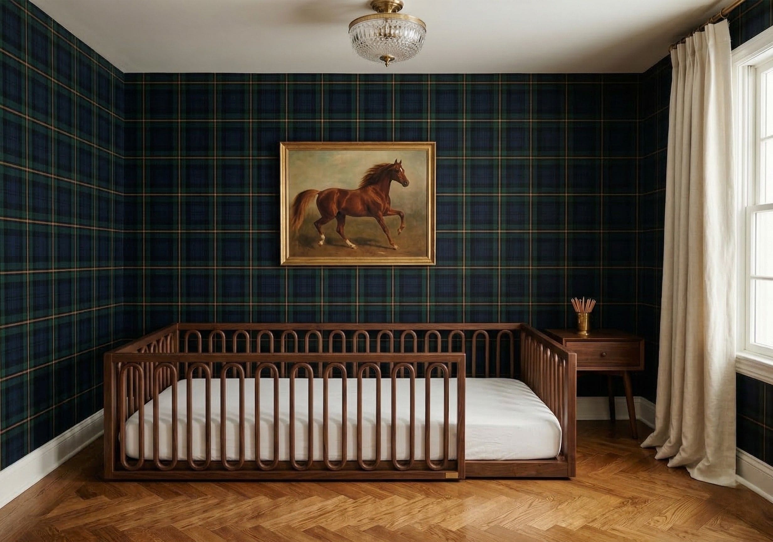 Petite Rêves Lune Floor Bed styled in nursery with green throw blanket and warm textiles